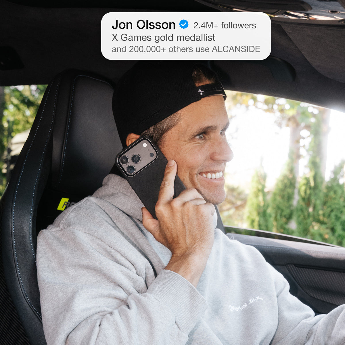 Jon Olsson on the phone in his Audi RS6 with the Deep Black ALCANSIDE Alcantara case #iPhone model:_iPhone 18 Pro|iPhone 18 Pro Max
